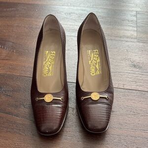 Salvatore Ferragamo Dark Brown Textured block heel with gold accent shoes.